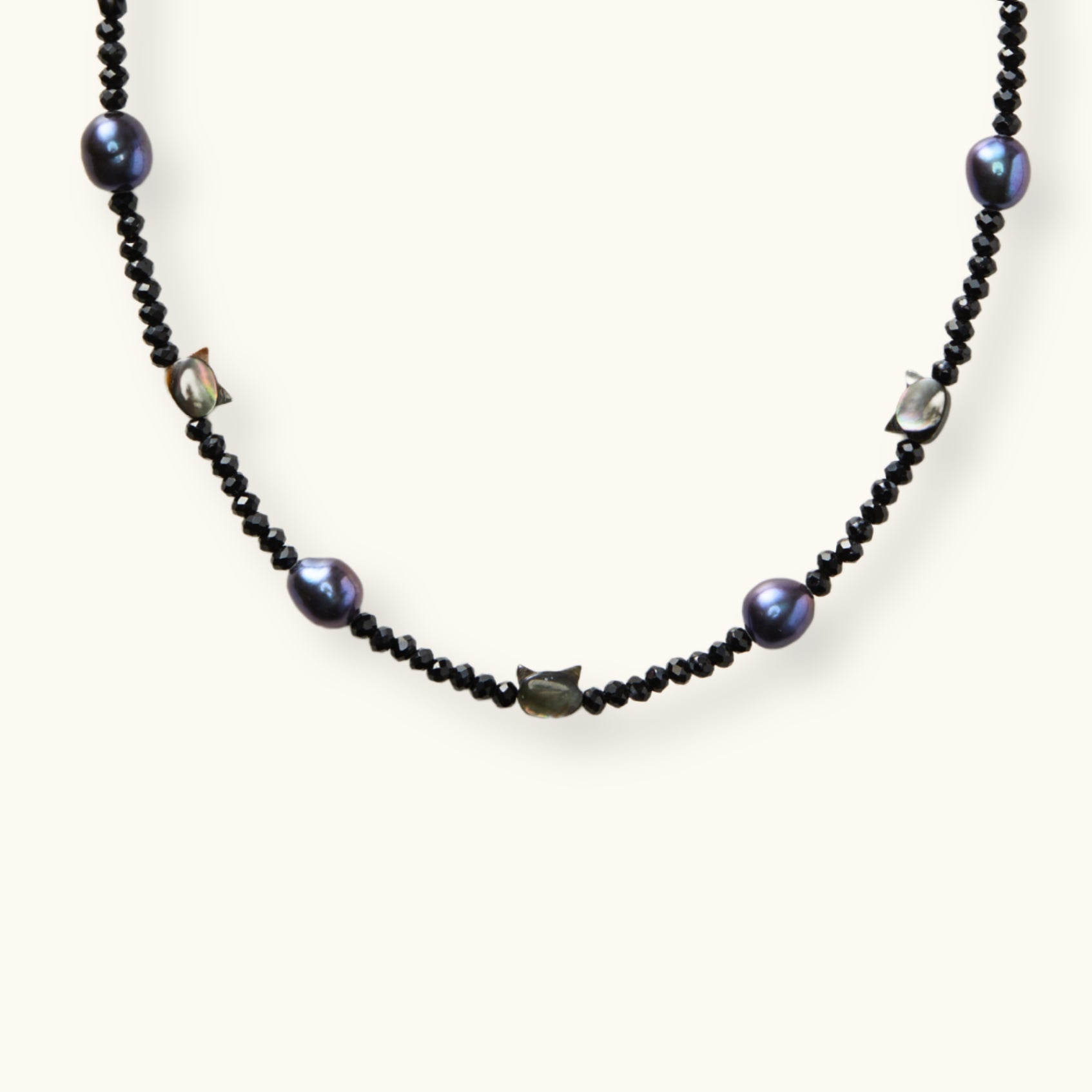 Handcrafted Necklace with Black Pearls, Faceted Onyx Beads, and Cat-Shaped Mother-of-Pearl Accents